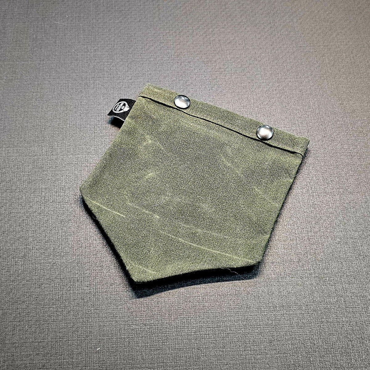 green waxed canvas shovel cover